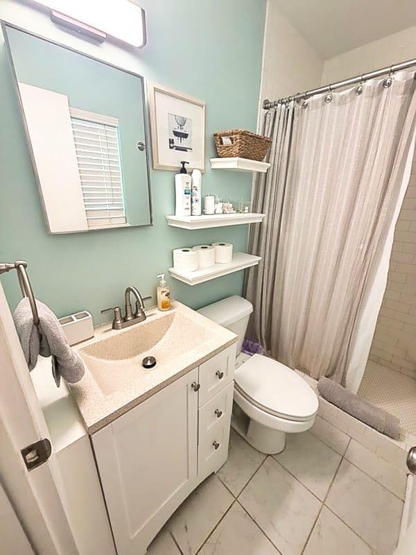 New modern light fixture and faucet in the bathroom