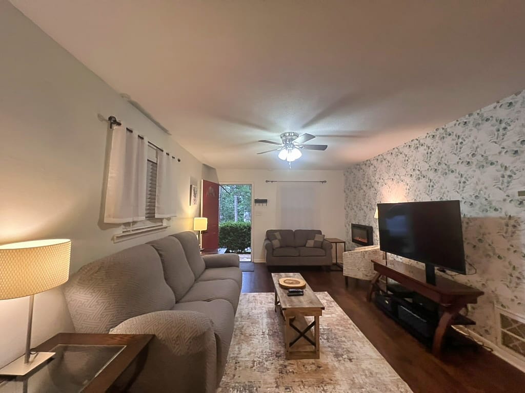 New sofa with a white cover in the refreshed living room